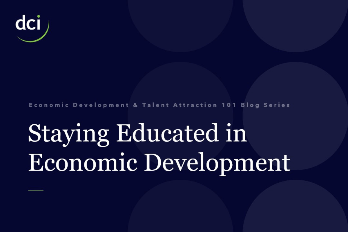 Staying educated in economic development dark blue and white graphic