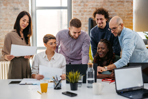 Diverse staff working to avoid adopting a fully dedicated staff model.