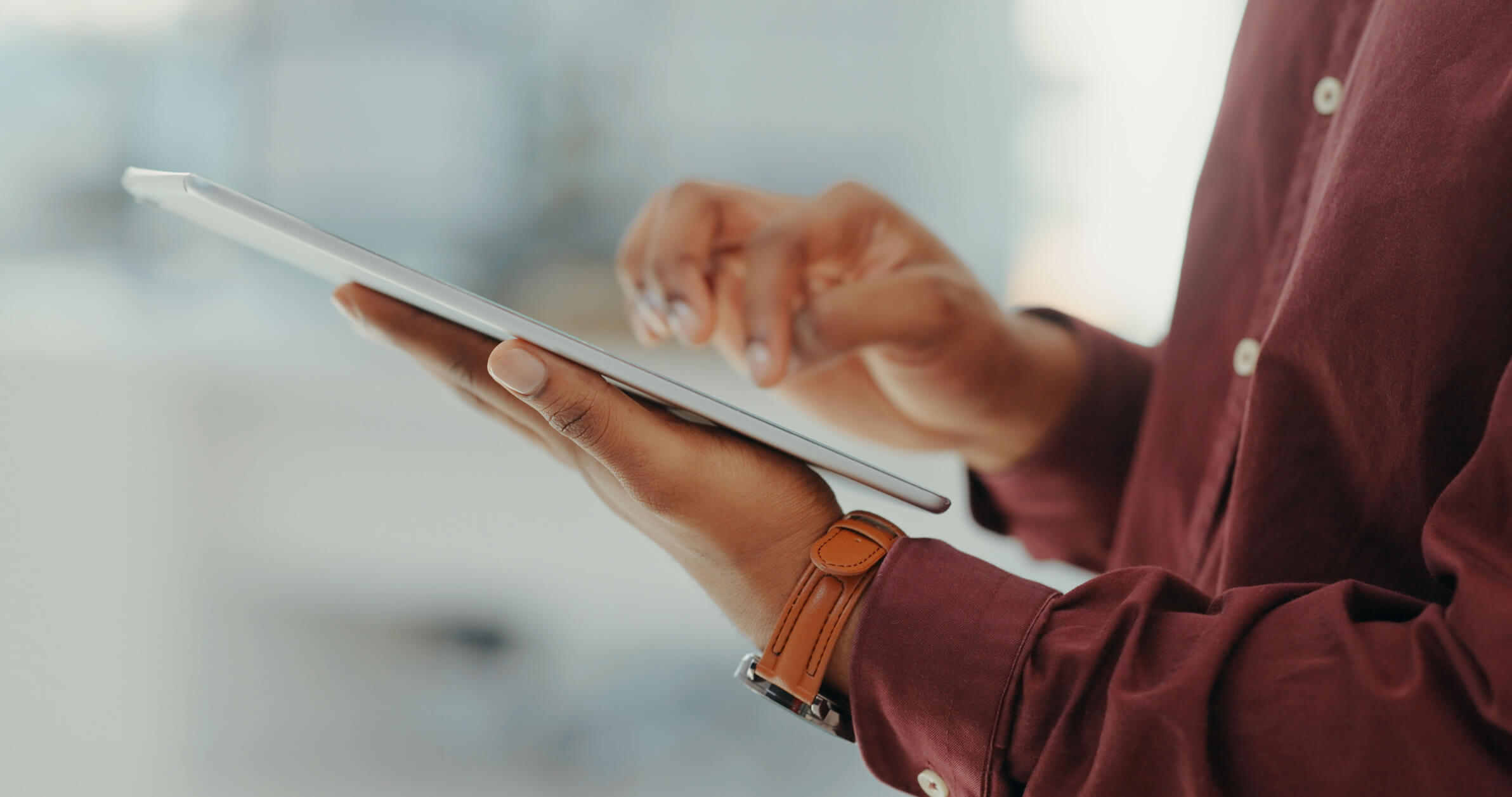 Woman doing b2b research on an iPad